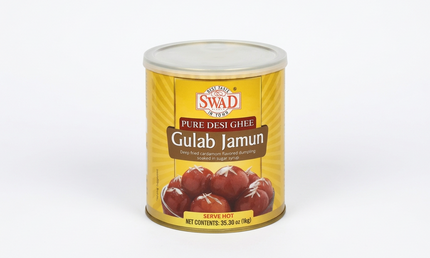 A 35.30 oz (1 kg) can of Swad Pure Desi Ghee Gulab Jamun, featuring a golden-yellow label with a brown banner and an image of red gulab jamun sweets on a white background.